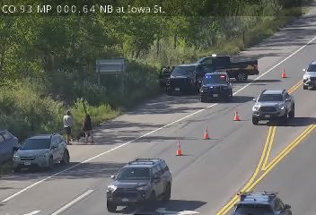 Police car with lights on the shoulder