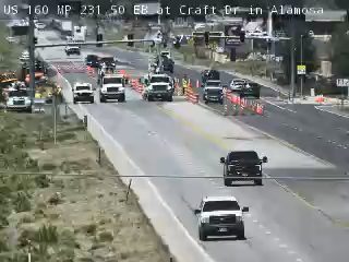 Road work with cones and personnel on US 160 EB at Craft Dr.