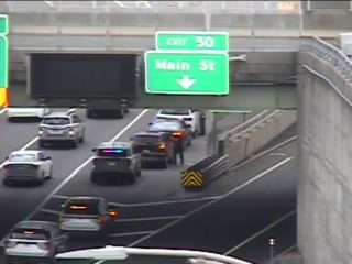 Police car with lights on the roadway