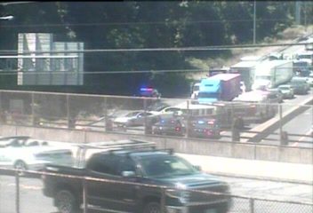 Police car with flashing lights on the roadway