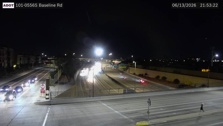 Person walking on the right side of the roadway