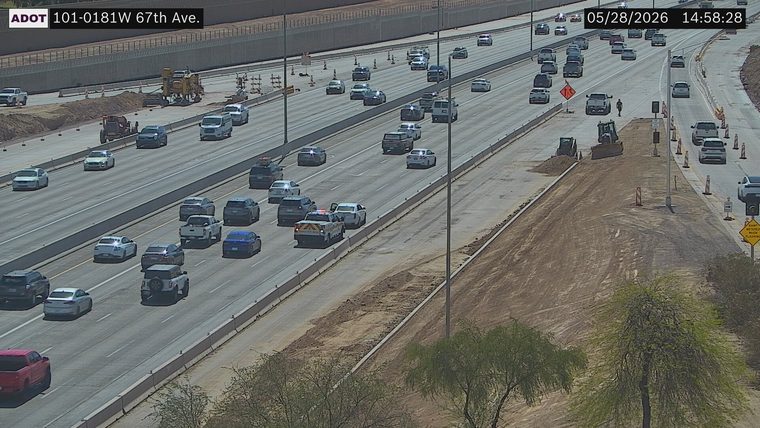 Police car with lights on the shoulder