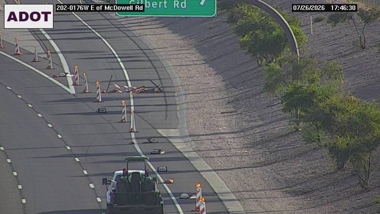 Construction cones and equipment in the left lane