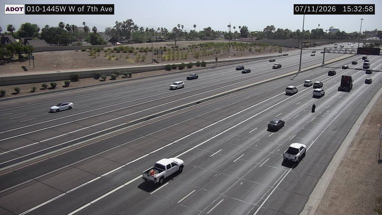 Person standing in the middle lane