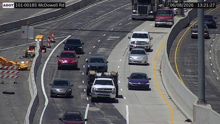 Construction cones and barriers in the left lane