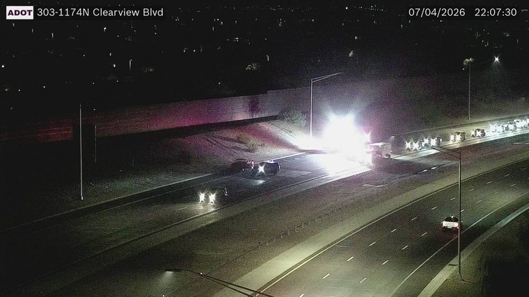 Vehicle fire in the left lane