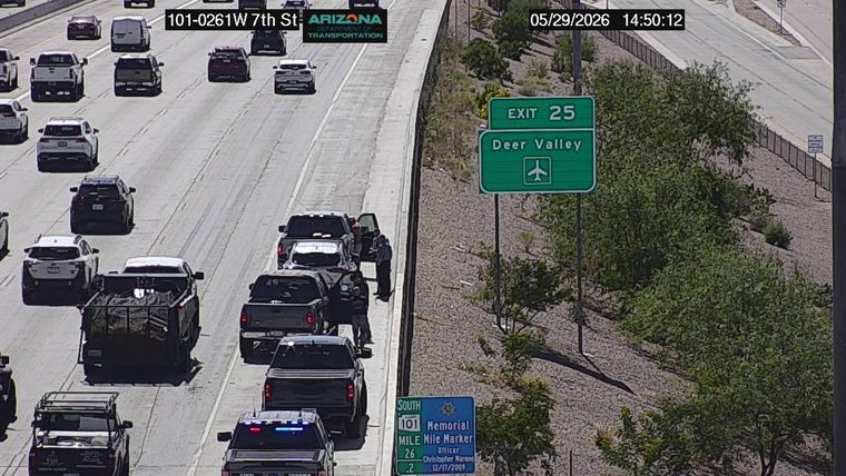 State trooper vehicle with lights on the right shoulder
