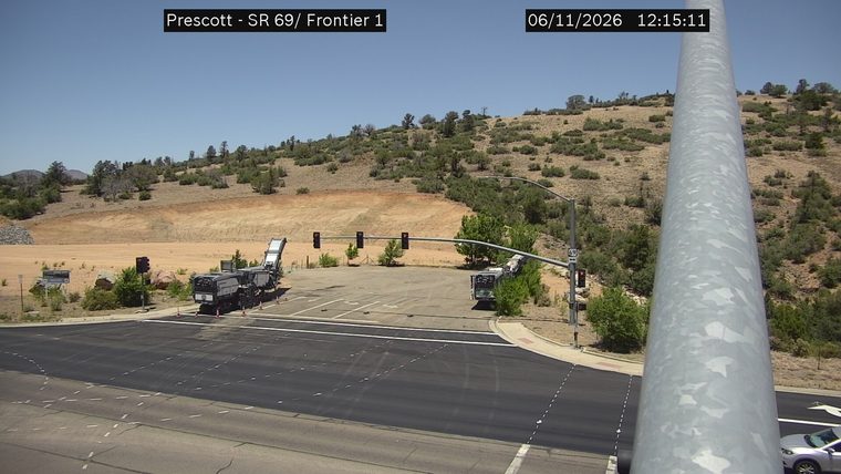 Construction equipment and cones in the right lane