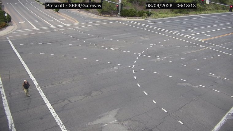 Person walking in the roadway