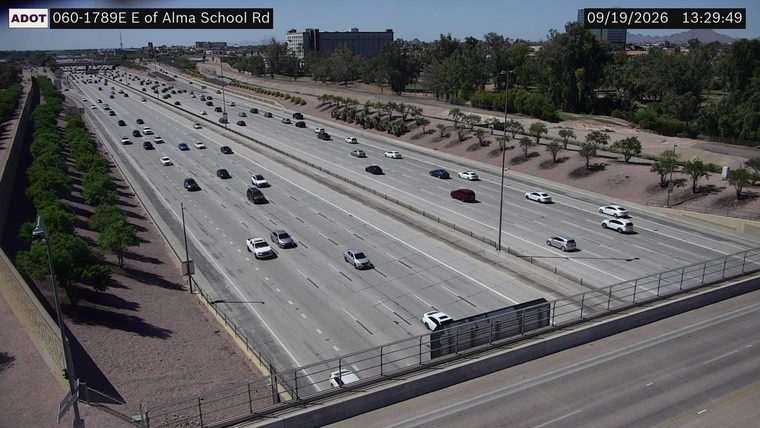 White car on its side on the right shoulder