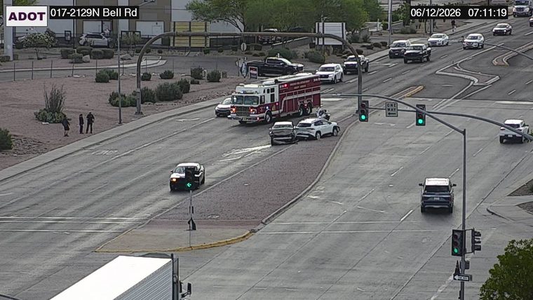 Fire truck and two vehicles in the intersection
