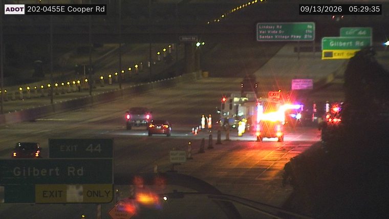 Emergency vehicle with red and blue lights on the roadway