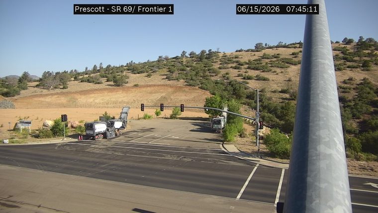 Construction equipment and cones in the right lane