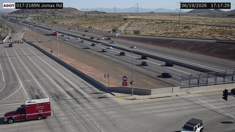 Phoenix Fire Department vehicle on the left side of the roadway