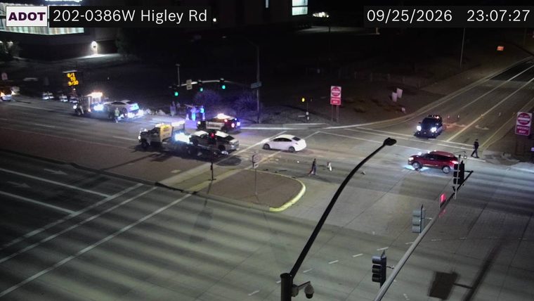 Police car with red and blue lights on the roadway