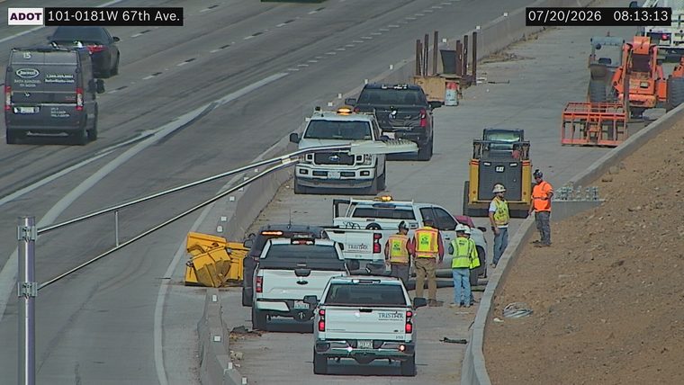 Workers and equipment in the right lane