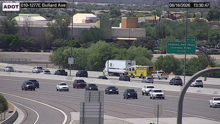 Fire truck and police car on the right shoulder