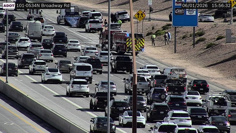 Fire truck and two people in the right lane