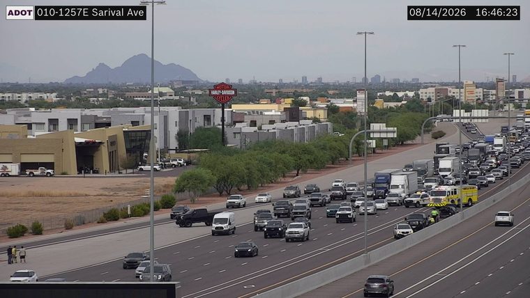 Fire truck and other emergency vehicles with lights on in the right lanes