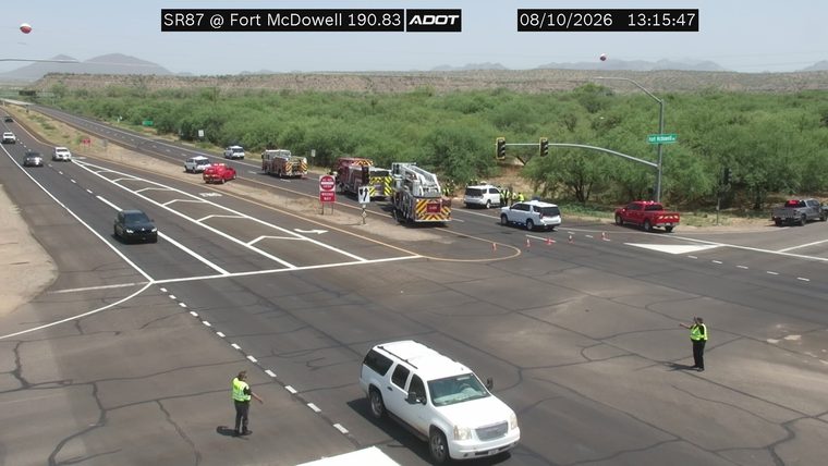 Multiple fire trucks and emergency vehicles on the roadway