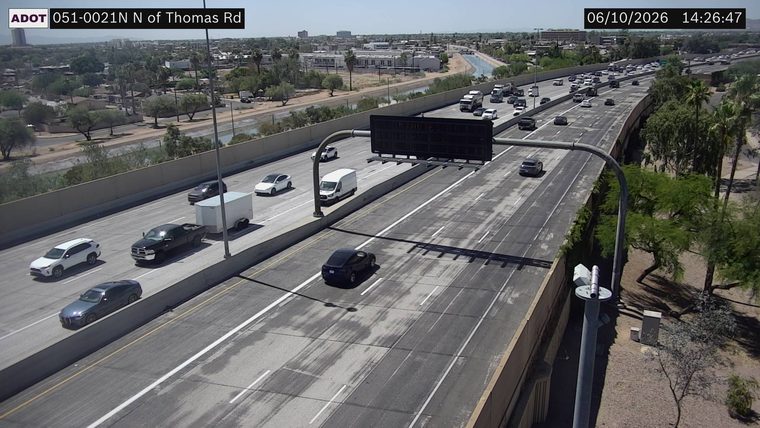 Fire truck and people in the left lane