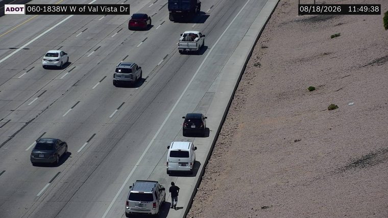 Person walking on the right shoulder