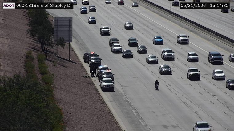 Police cars and officers on the left shoulder