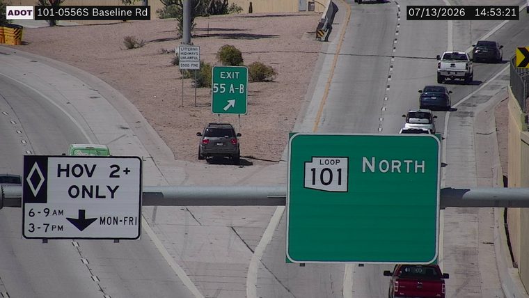 SUV off the travel lanes on the dirt shoulder