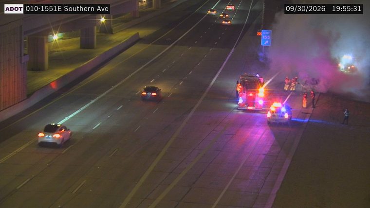 Fire and smoke in the right lane with multiple emergency responders and vehicles