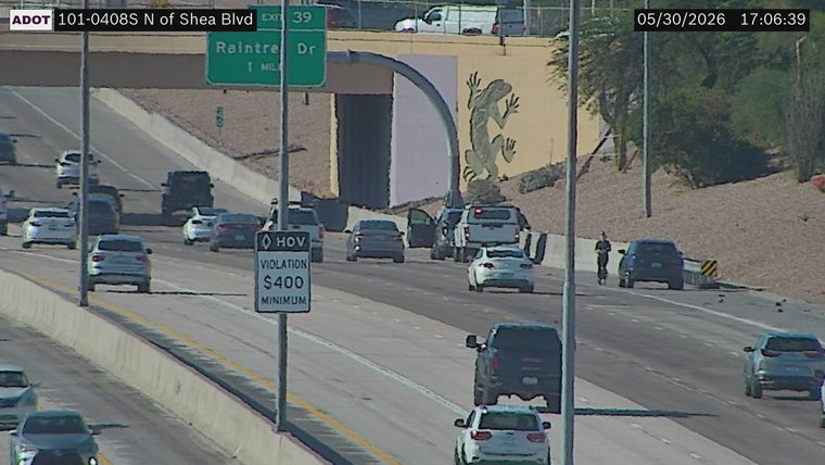 Person walking on the right shoulder