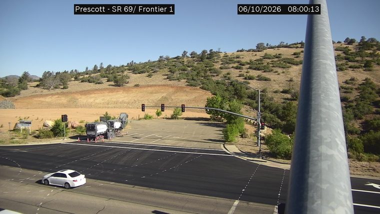 Construction equipment and cones in the right lane
