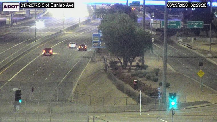 Vehicle on fire in the left lane