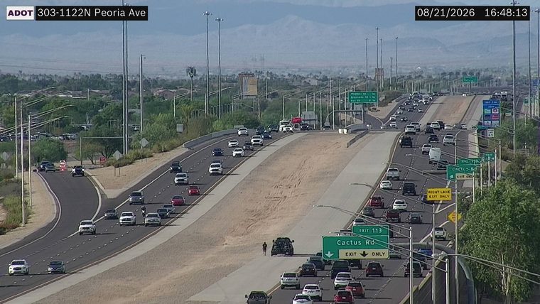 Person walking on the median