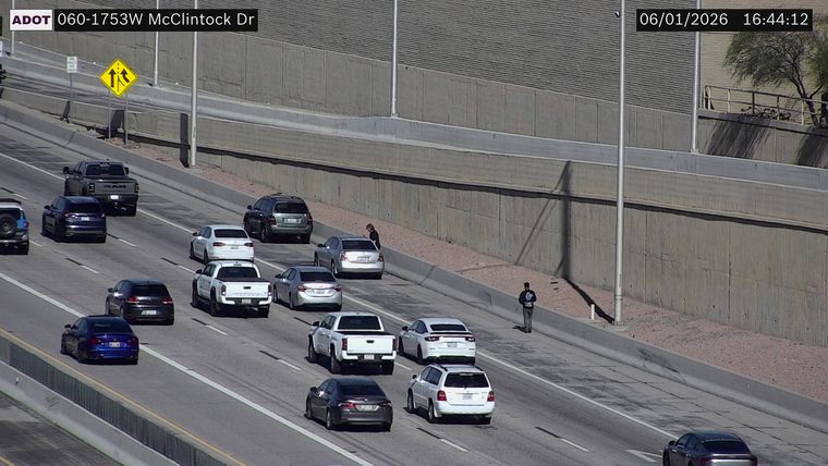 Person walking on the shoulder