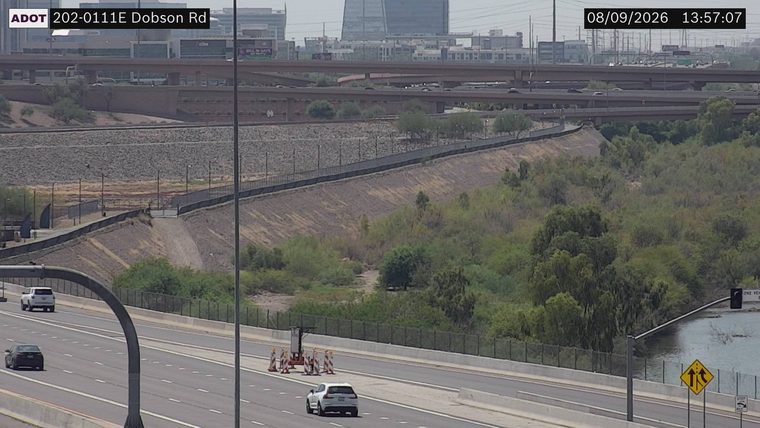 Construction cones and a work platform in the right lane