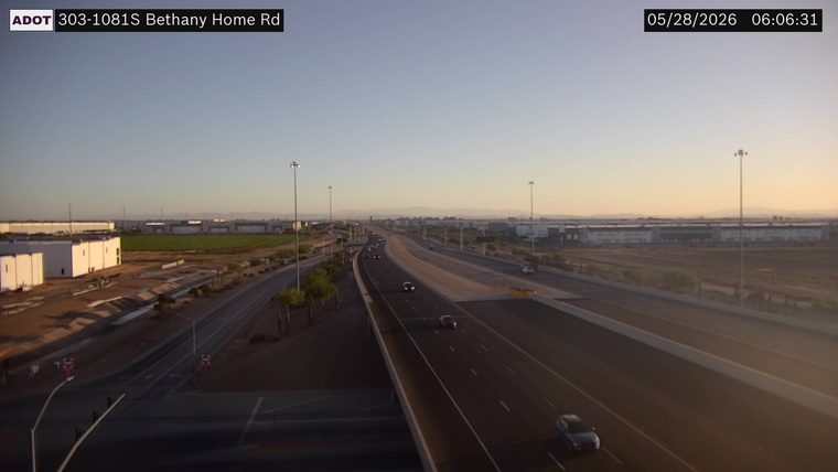 White vehicle on the right shoulder