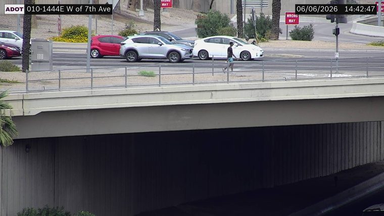 Person walking on the roadway