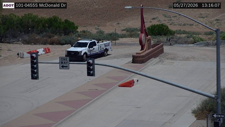 ADOT Incident Response Unit truck parked on the dirt shoulder near the intersection
