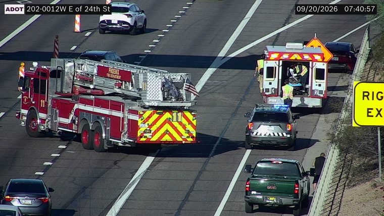Fire truck, ambulance, and police car on the roadway