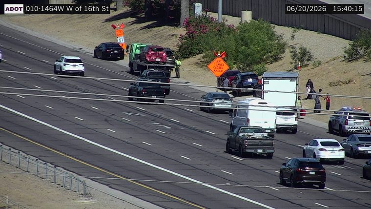 Police car with lights on the right shoulder