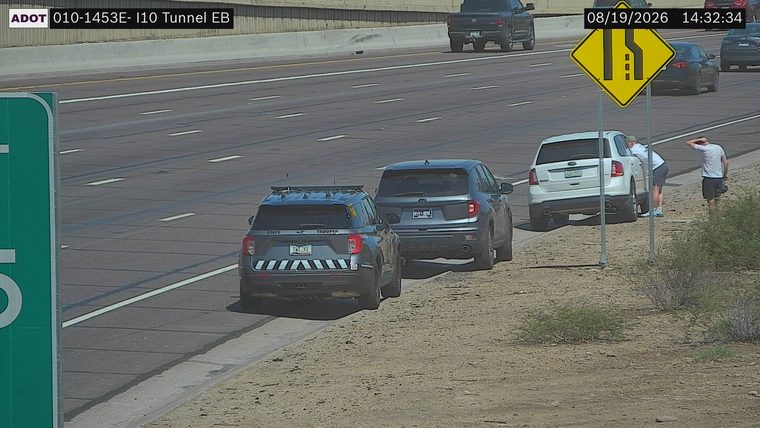 State Trooper vehicle on the right shoulder