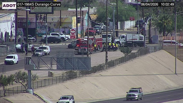 Fire truck and multiple responders in the roadway