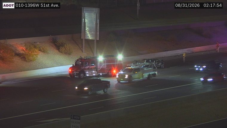 Fire truck and other vehicles on the right shoulder