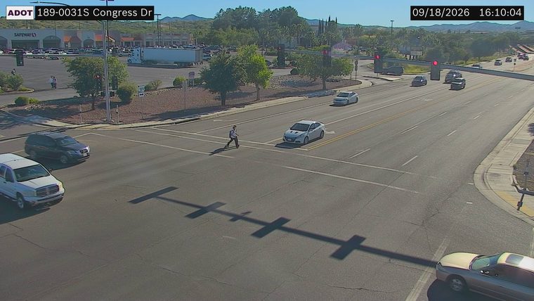 Pedestrian crossing the roadway at the intersection