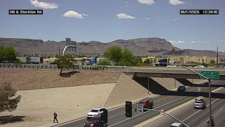 Person walking on the side of the road