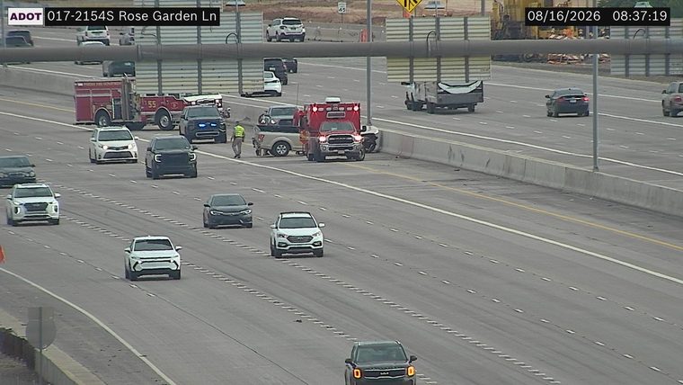 Fire truck and ambulance with personnel on the right shoulder