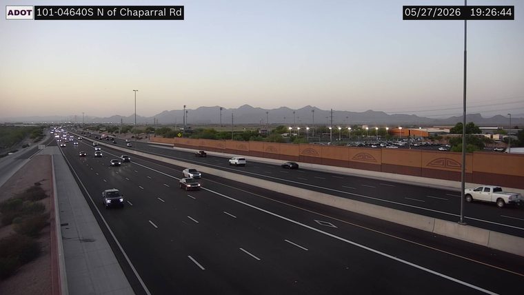 White pickup truck on the right shoulder