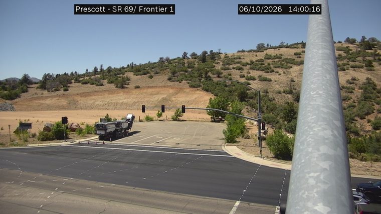 Construction equipment and cones in the right lane