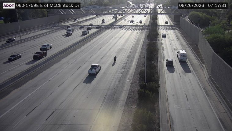 Person walking in the middle lane
