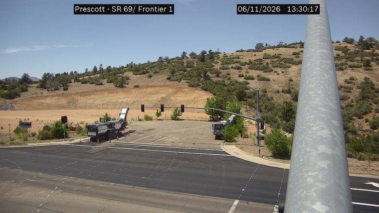 Construction equipment and cones in the right lane